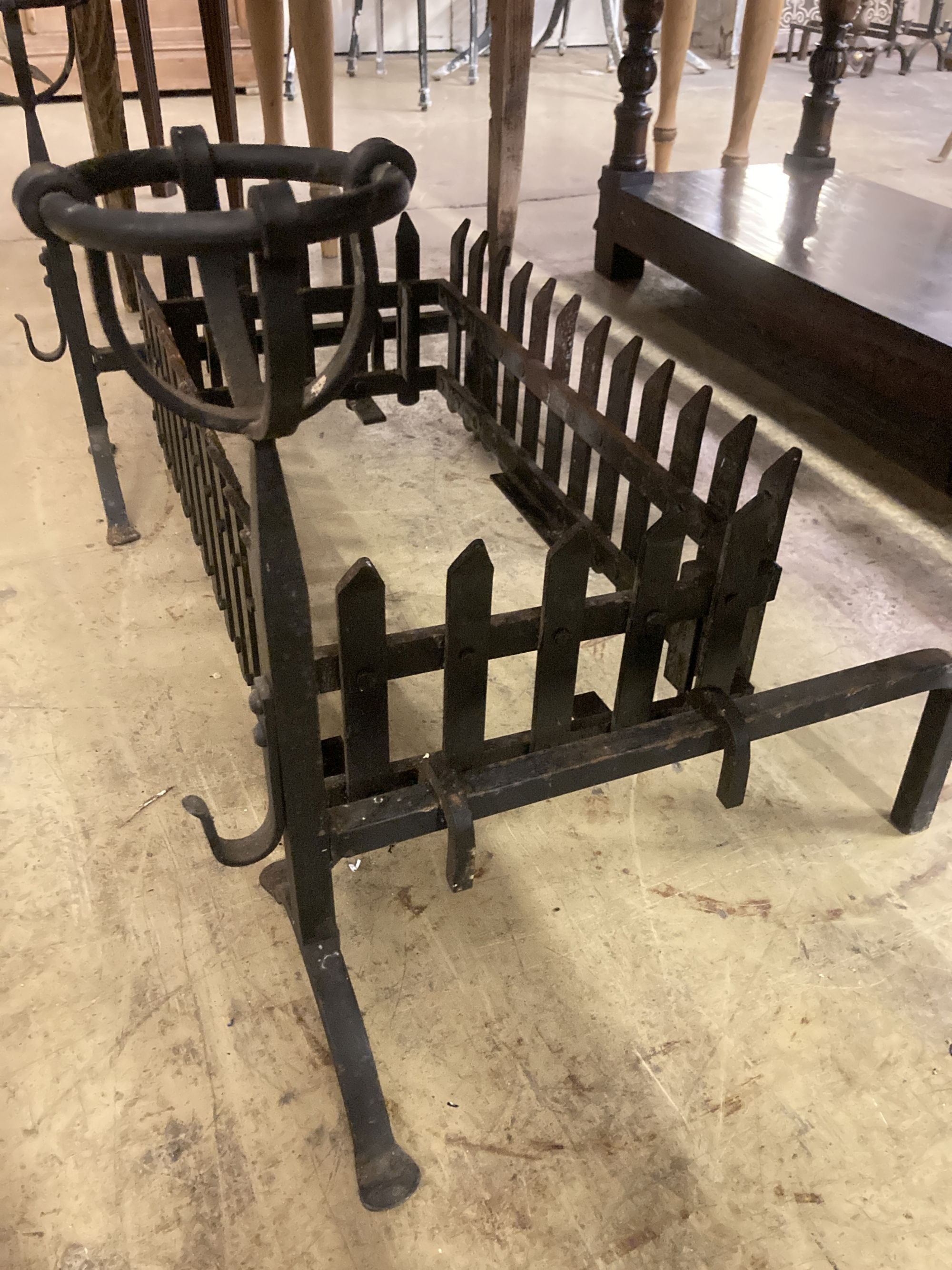 A rectangular wrought iron fire basket, width 96cm, depth 46cm, height 49cm and dogs